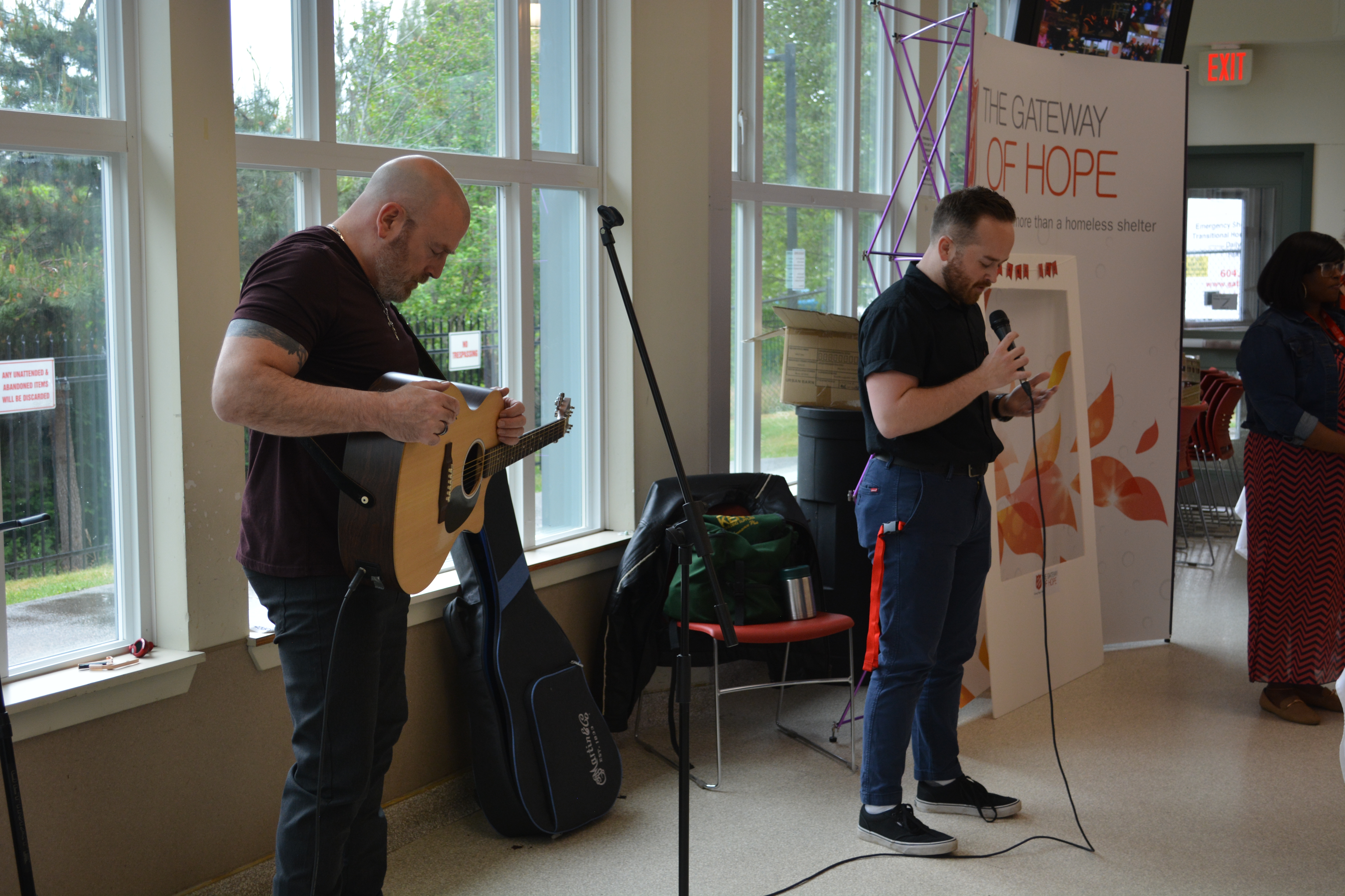 A singing class taking place inside the Langley Gateway of Hope